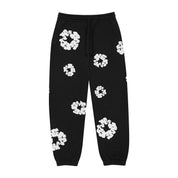 DENIM TEARS- The Cotton Wreath Sweatpants 'Black'